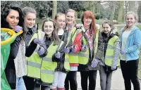  ??  ?? ●● Yasmin Crawford, Connie Jordan, Eloise Webster, Ruby Singleton, Kirstin Atkinson, Bethany Henshaw, Charlotte Warren and Adele Le Moignan clean up for the Queen