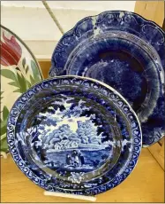  ?? TRACEE HERBAUGH VIA AP ?? Some plates for sale at the Brimfield Flea Market in Brimfield, Mass., are shown.