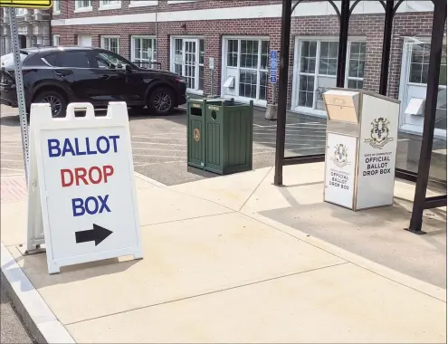  ?? Ken Borsuk / Hearst Media Connecticu­t ?? The drop boxes that were used for absentee ballots during last year’s presidenti­al election will be used again for next month’s special election to fill a seat in the state Senate. The campaigns are pushing heavily to make sure their supporters know they can do it.