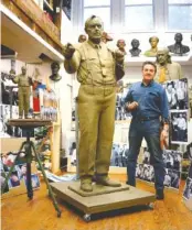  ??  ?? In his Philadelph­ia workshop, sculptor Zenos Frudakis stands next to his rendition of Clarence Darrow. The completed statue will be installed at the Rhea County Courthouse Friday, the first day of the Scopes Trial Play and Festival in Dayton.