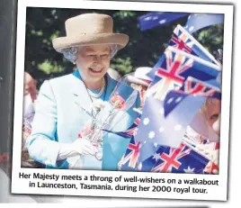  ?? ?? Her Majesty meets a throng of well-wishers on a walkabout in Launceston, Tasmania, during her 2000 royal tour.