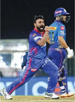  ??  ?? Delhi Capitals leg-spinner Amit Mishra celebrates a Mumbai Indians wicket during an IPL game in Chennai on Tuesday.