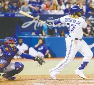  ?? MARK BLINCH / GETTY IMAGES ?? Vladimir Guerrero Jr. of the Toronto Blue Jays leads American League rookies in hits (93), doubles (22)
and extra-base hits (36).