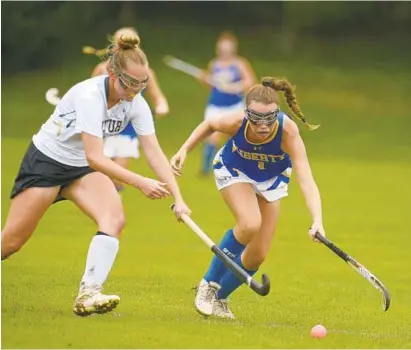  ?? DYLAN SLAGLE/BALTIMORE SUN MEDIA GROUP ?? Century’s Maria Rekus, left, and Liberty’s Kaliegh Ward pursue the ball in the first half of the Lions’ 1-0 win over the Knights.