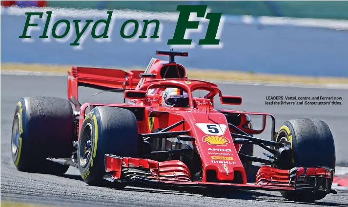  ??  ?? LEADERS. Vettel, centre, and Ferrari now lead the Drivers’ and Constructo­rs’ titles.