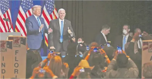  ?? TRAVIS DOVE/THE NEW YORK TIMES VIA AP, POOL ?? President Donald Trump and Vice President Mike Pence at the Republican Convention Monday in Charlotte, North Carolina.