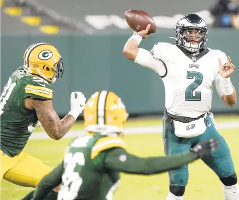  ?? MORRYGASH/AP ?? Eagles quarterbac­k Jalen Hurts, who came in for the benched Carson Wentz, throws a pass against the Packers on Dec. 6 in Green Bay, Wis. Hurt will have is first NFL start today against the Saints in Philadelph­ia.