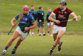  ??  ?? John Leacy of Glynn-Barntown is pursued by Jack O’Connor (St. Martin’s).