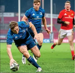  ??  ?? BRUTE FORCE: Munster’s Mike Haley (left) is hauled down at Thomond Park last night where Jordan Larmour (above) struck for the winning try after Leinster No10 Johnny Sexton (right) limped off in the second half