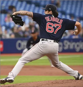  ?? AP ?? MAKING A FAN: Connor Seabold throws to a Toronto Blue Jays batter in the first inning of the Sox’ 7-2 loss on Monday night, a performanc­e that caught the eye of David Price.