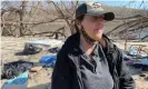  ?? Photograph: Andrew McCormick ?? Terri Domer visits the riverside encampment in Cedar Rapids, where she weathered last August’s derecho.