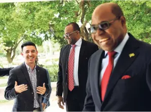  ?? RICARDO MAKYN MULTIMEDIA PHOTO EDITOR ?? From left: Carlos Munoz, head of public policy, Central America and the Caribbean, Airbnb Inc shares a hearty laugh with Donovan White, director of tourism, and Minister of Tourism Edmund Bartlett.