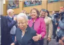  ?? EDDIE MOORE/JOURNAL ?? Gov. Susana Martinez holds on to her sister, Lettie, as she enters the House chamber on Tuesday, followed by her husband, Chuck Franco.