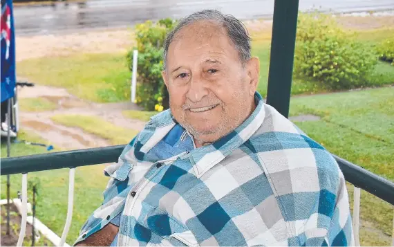  ?? Picture: Cameron Bates ?? Ingham author and pioneering sugarcane worker Mario Torrisi on the balcony of his Davidson St home just minutes after a utility vehicle lost control and rolled into his front garden a day on his 90th birthday in 2022.