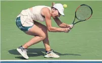  ?? ANDRES KUDACKI THE ASSOCIATED PRESS ?? Simona Halep returns a shot to Kaia Kanepi. Halep has lost 12 of 34 first-round matches at grand slam events.