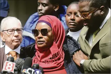  ?? Ned Gerard / Hearst Connecticu­t Media ?? Omo Mohammed, Mubarak Soulemane’s mother, speaks during a news conference near the site of her son’s death in West Haven on Thursday. Soulemane, 19, was shot and killed by State Trooper Brian North following a vehicle pursuit in January 2020. North was arrested and charged with manslaught­er.