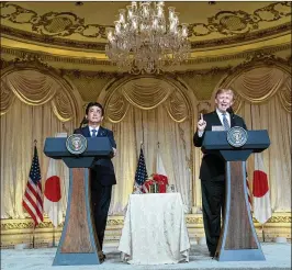  ?? THE NEW YORK TIMES ?? President Donald Trump and Japanese Prime Minister Shinzo Abe hold a joint news conference at Mar-a-Lago on April 18. About $1 million of the total $1.4 million that politicos have spent at the club since 2003 flowed in after Trump announced his...