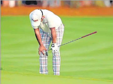  ?? ?? Anirban Lahiri reacts after his approach on the final hole landed just outside the green in The Players Championsh­ip.