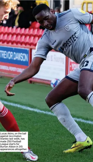  ??  ?? Lucas Akins, on the ball against Accrington Stanley last week, has made 250 Football League starts for Burton Albion in 315 appearance­s altogether.