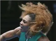  ?? KIN CHEUNG — THE ASSOCIATED PRESS ?? Serena Williams serves to Tatjana Maria during their firstround match at the Australian Open in Melbourne, Australia on Jan. 15.