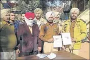  ?? HT PHOTO ?? The accused in police custody in Amritsar on Tuesday.