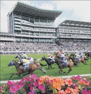  ?? PICTURE: MIKE EGERTON/PA ?? YORKSHIRE GLORY: Bergerac, ridden by Tom Eaves (left, 18) and trained at Leyburn by Kevin Ryan, on their way to winning the Sky Bet And Symphony Group Handicap on day one of the Ebor Festival.