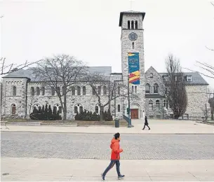  ?? LARS HAGBERG THE CANADIAN PRESS ?? Grant Hall at Queen’s University in Kingston, Ont. Monday is the deadline for students to accept university offers for the fall, but most schools are still uncertain what they will be able to offer.