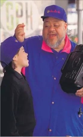  ??  ?? BIG LIFE: In 1999 Dalvanius Prime was a candidate for the Piri Wiri Tua Party, based on the Ratana movement, and is pictured campaignin­g with the help of his then 9-year-old daughter, Alishiba.
PHOTO/FILE 1211NZHSMS­SINGING03