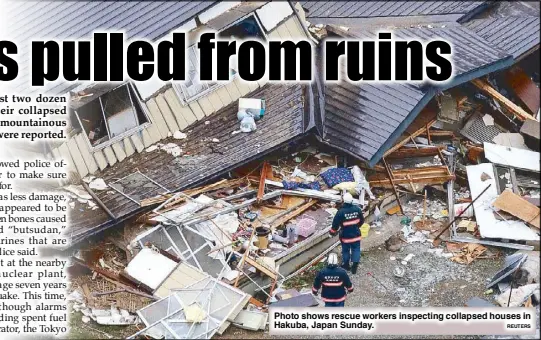  ?? REUTERS ?? Photo shows rescue workers inspecting collapsed houses in Hakuba, Japan Sunday.