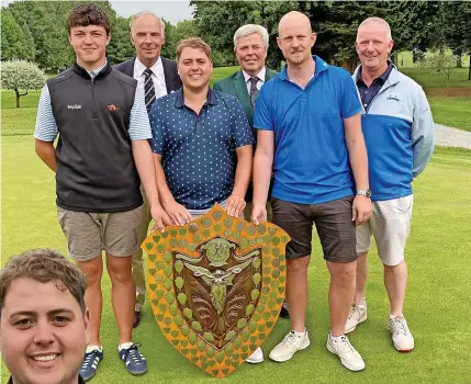  ?? ?? TRIUMPH: Left, new amateur county champion Coby Cartwright with his trophy. Above, Coby, third from left, with the Cosby team showing off the Corah Shield. From left, Will Plant, Richard Barker, Hinckley GC captain Clive Pitt, Luke Burrows and Cosby GC captain Martin Burrows. Below, Coby with Richard Barker and Clive Pitt