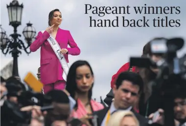  ?? GETTY IMAGES ?? Miss USA Noelia Voigt – seen posing for photos on the House steps in the US Capitol – has resigned her post, along the current Miss Teen USA title holder and Miss USA’S social media director to take a stand over alleged bullying in the organisati­on.