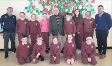  ?? ?? Joe Quinn with members of Scoil an Athar Tadhg Green Schools Committee, along with Mr Eoin O’Shea, Green Schools coordinato­r and school principal, Mr Cormac Duggan.