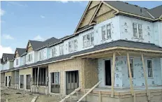  ?? BRIAN THOMPSON/POSTMEDIA NETWORK FILES ?? A townhouse developmen­t by Empire Homes on English Lane in Brantford, Ont., valued at $1.5 million.