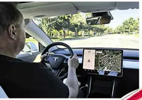  ??  ?? NEED TO KNOW Single central touchscree­n controls everything in the Model 3’s cabin; it even doubles as a speedomete­r