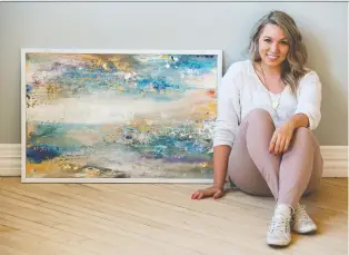  ?? PHOTOS: BRANDON HARDER ?? Artist Justine Schlosser sits with a piece of her art painted on a corkboard from the Restore that she is submitting for a March 7 gala raising funds for Habitat for Humanity.