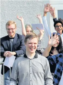  ??  ?? Delighted pupils at St Clare’s School in Porthcawl celebrate their A-level results