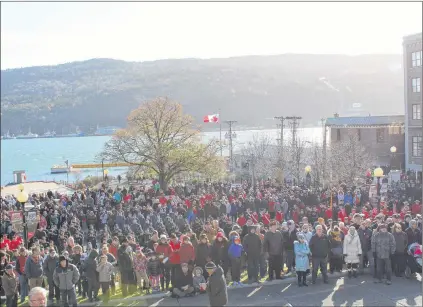  ?? JUANITA MERCER/THE TELEGRAM ?? A crowd gathered at the National War Memorial in St. John’s for Remembranc­e Day and to mark 100 years since the end of the First World War.