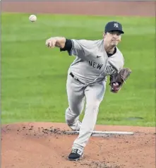  ?? Adrian Kraus / Associated Press ?? Michael King of the Yankees gave up five earned runs in 22⁄3 innings vs. Toronto, despite striking out six.