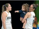  ??  ?? Sisters Natalie Taylor, right, and Kalani Purcell with the Tall Ferns at the Commonweal­th Games last year.