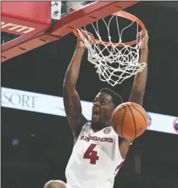  ?? NWA Democrat-Gazette/J.T. Wampler ?? SHOWTIME: Arkansas’ Daryl Macon dunks against Colorado State on Dec. 5 at Bud Walton Arena in Fayettevil­le. The Razorbacks return from their Christmas break to host California State-Bakersfiel­d tonight at 7 p.m. at Walton Arena for their final...