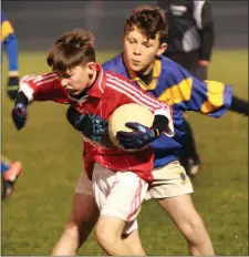  ??  ?? Rory Dineen of Gorey is tackled by Taghmon’s Morgan Nash-Colfer.