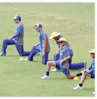  ??  ?? Australian cricket team members warm up during a practice session in Chennai. Australia and India are scheduled to play five one-day internatio­nal (ODI) and three Twenty20 matches, with the first ODI scheduled to be held Sept. 17 in Chennai. (AP)