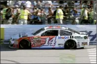  ?? AP/CHET STRANGE ?? Tony Stewart returned to finish 19th at Richmond Internatio­nal Raceway on Sunday. His return also was marked by a $35,000 fine for criticizin­g NASCAR’S safety policy concerning the number of lug nuts each team is required to use.