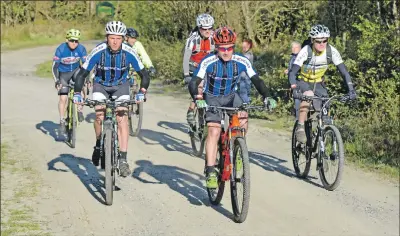  ?? 25_c43ultra01 ?? Adventure event the Kintyre Way Ultra added a cycle race in 2017. A group starts with eventual winner, Scottish enduro rider, Keith Forsyth front left.