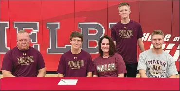  ?? CHUCK RIDENOUR/SDG Newspapers ?? Marshall Shepherd, second from left, finalized his college plans to attend Walsh University where he will also play baseball. Joining him for the day were his parents — Ron and Heather Shepherd — twin brother Luke, right, and younger brother Michael, standing.