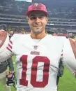  ?? KIRBY LEE/USA TODAY SPORTS ?? 49ers quarterbac­k Jimmy Garoppolo celebrates after the 38-10 victory.