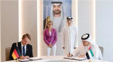  ?? ?? ±
Dr Thani Al Zayoudi and Dr Franziska Brantner witness the signing ceremony.