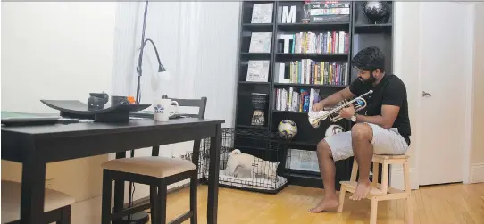  ?? PHOTOS: CHRISTINNE MUSCHI ?? Shanil Perera polishes his trumpet in a nook off his dining area in his apartment in Old Montreal.