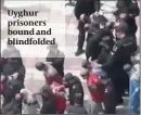 ?? PHOTO:SKY NEWS ?? Uyghur prisoners bound and blindfolde­d
