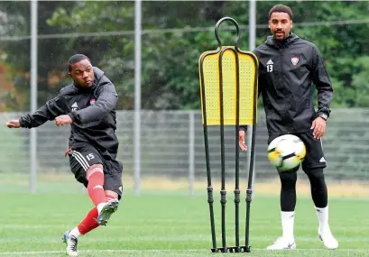  ?? Supplied photo ?? The Uae’s ismail al hammadi takes a shot while teammate Khamis ismail looks on in the austrian city of salzburg. —